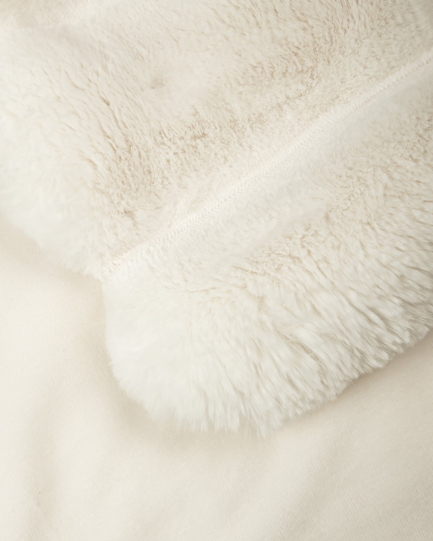 close up fabric shot of a dimensional faux fur blanket in moon