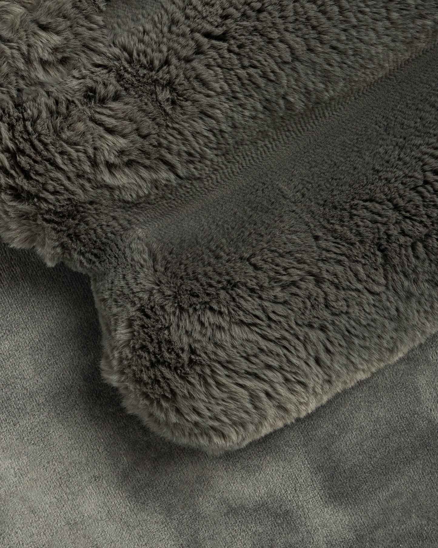 close up fabric shot of a dimensional faux fur blanket in peak
