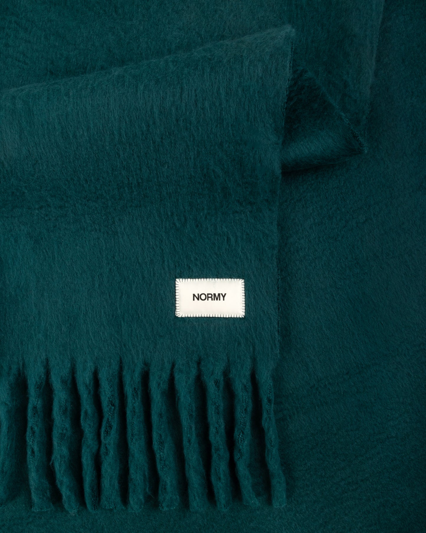 Close up fabric shot of a faux mohair blanket in alpine