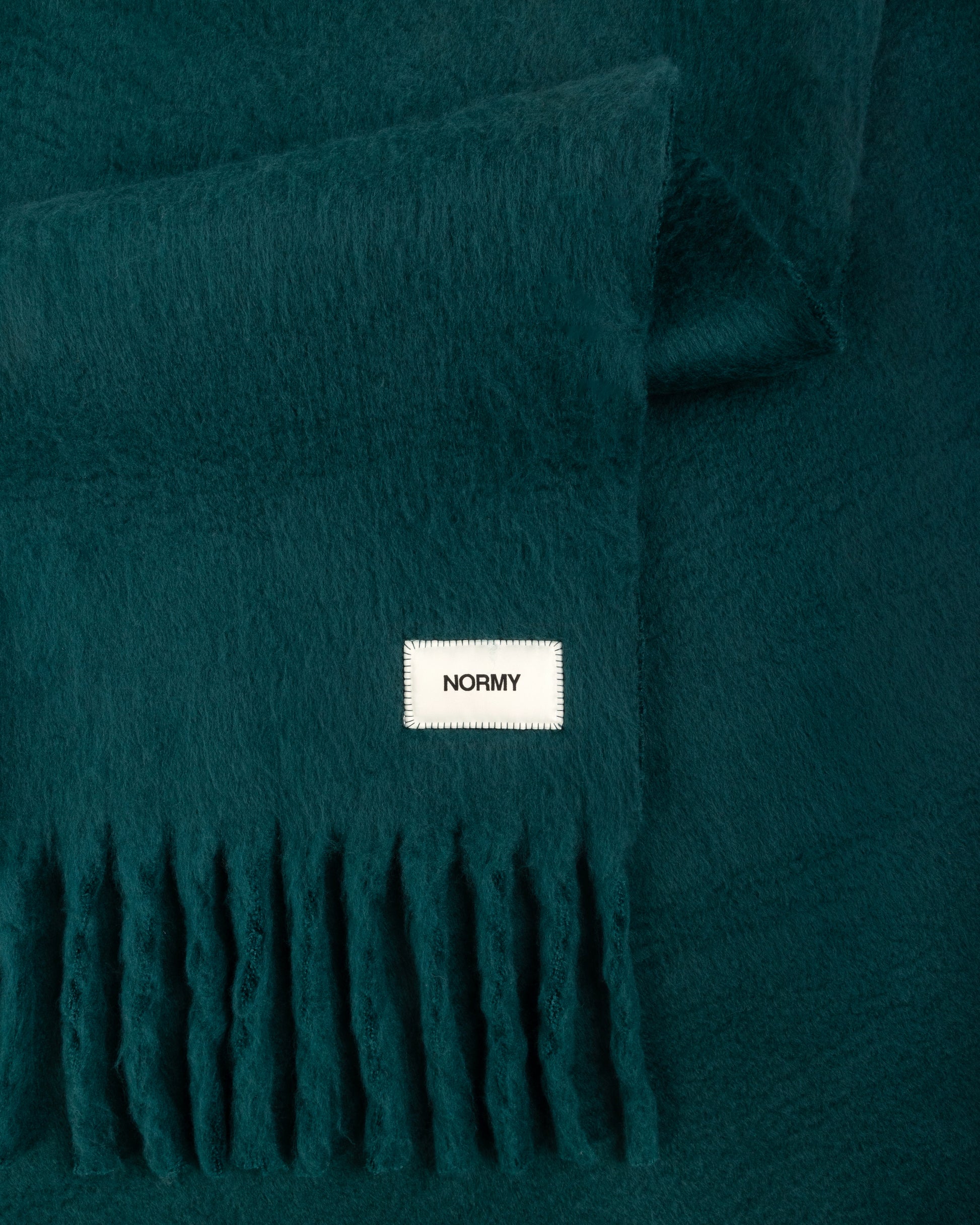 Close up fabric shot of a faux mohair blanket in alpine