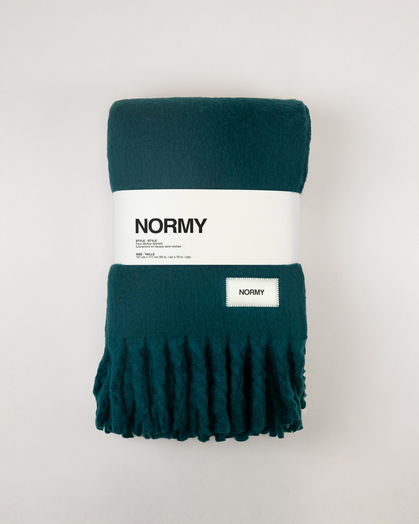 Faux mohair blanket in alpine packaged in Normy packaging